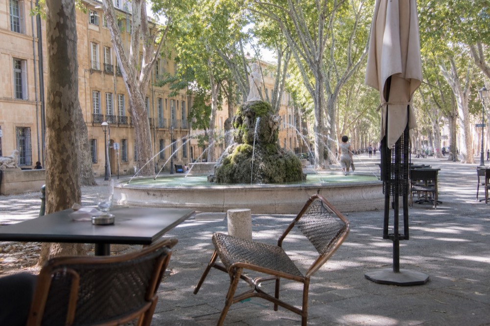 Cours Mirabeau in Aix-en-Provence with plane trees, no text, no logos, no people