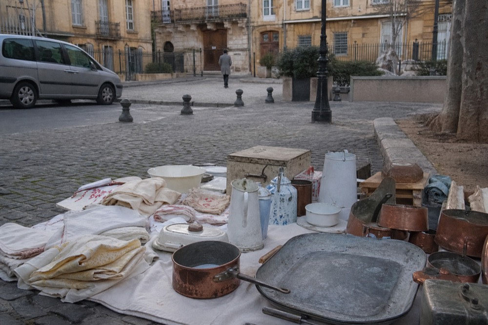 Antiques market stall with vintage items, no text, no logos, no people