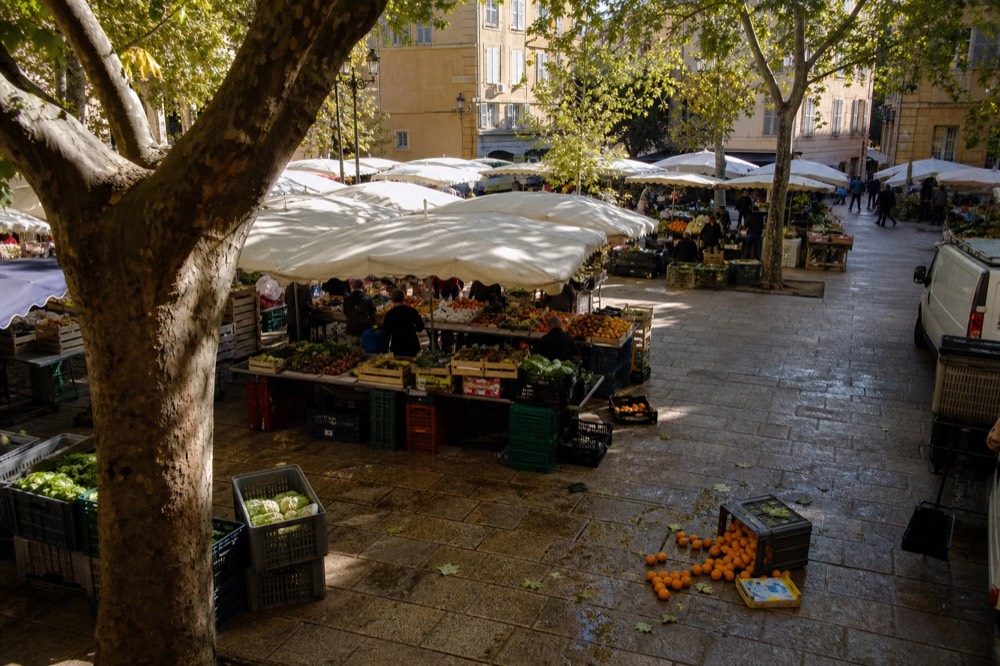 Place Richelme market with fruit and vegetable stalls, no text, no logos, no people