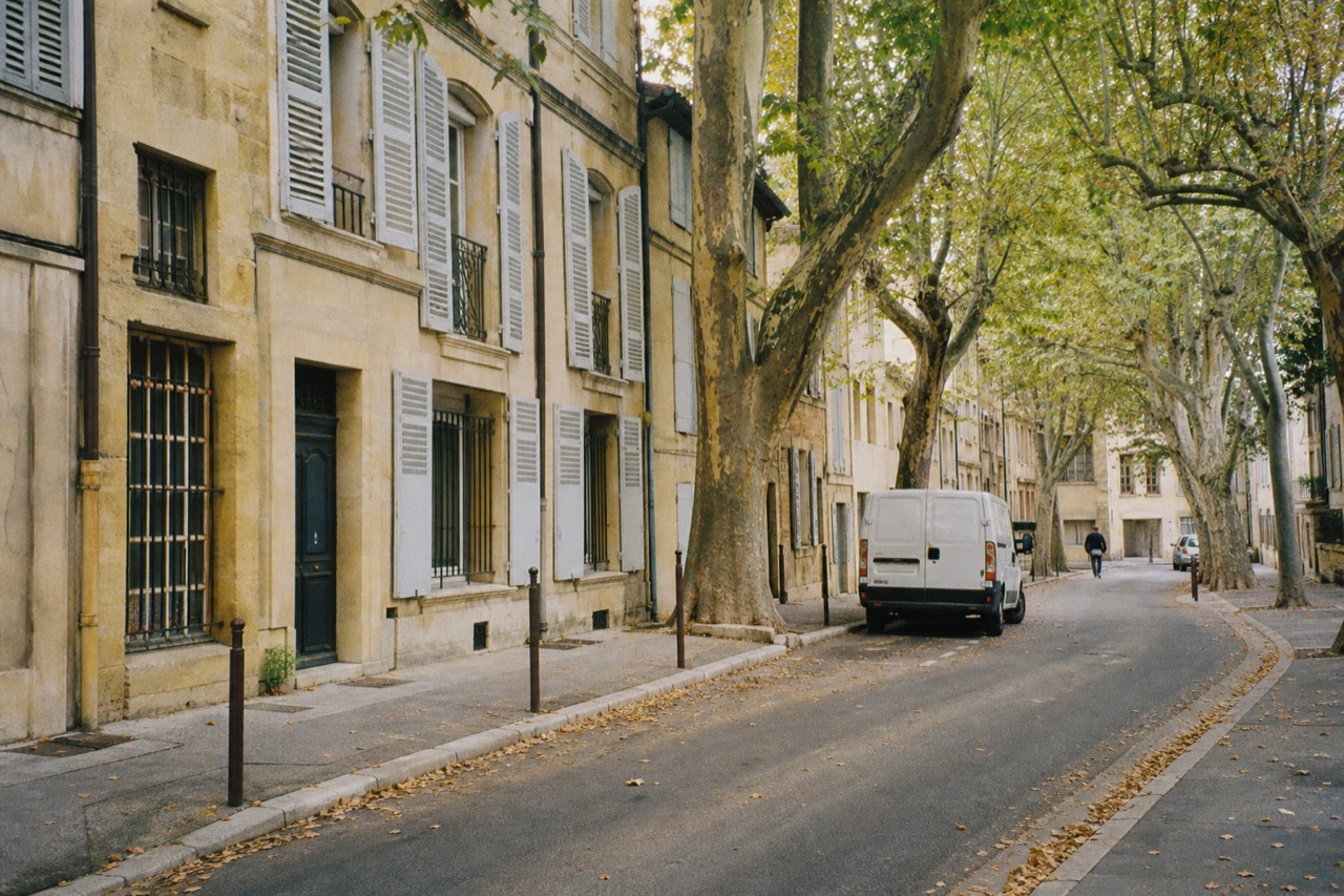 Aix-en-Provence street scene with plane trees, no text, no logos, no people