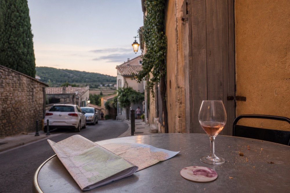 A map of Provence wine regions with a glass of rosé on the side, no text, no logos, no people